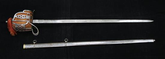 An early 20th century Scottish basket hilt broad sword, overall 40.5in.